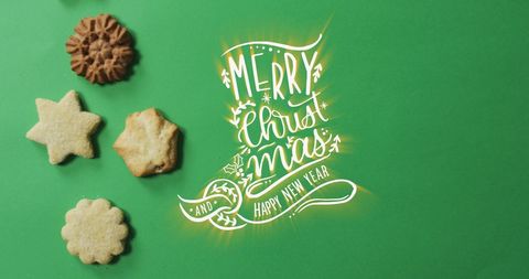 Festive Christmas Cookies on Green Background