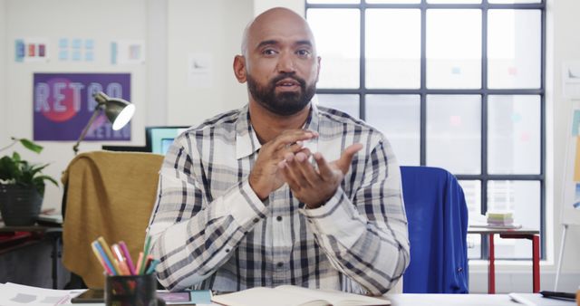 Business Professional Gesturing During Office Meeting - Download Free Stock Images Pikwizard.com