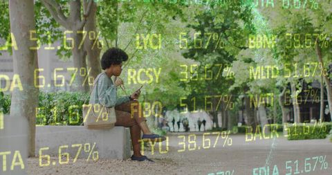 Woman in Park Checking Stock Market Data on Smartphone