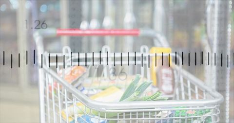 Measuring chrome grocery cart with digital ruler overlay in supermarket aisle full of groceries