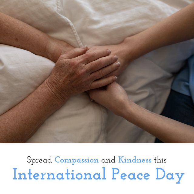 Caucasian comforting hands with spread compassion and kindness this international day of peace text. Digital composite, celebration, commemorating and strengthening ideals of peace, avoid violence.