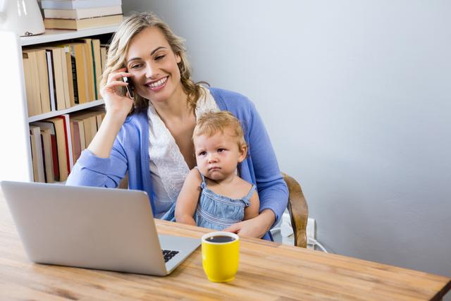 This image is perfect for articles or blog posts about work-life balance, remote work, parenting while working from home, and family life. It can also be used in advertisements and social media posts promoting technology, communication, and modern parenting solutions. The bright and positive atmosphere makes it well-suited for conveying themes of productivity and positive family dynamics.