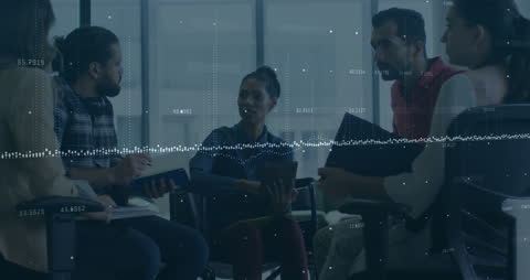 Diverse Team Collaborating in Modern Office with Data Visualization