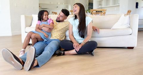 Happy Family Relaxing in Modern Living Room Interior
