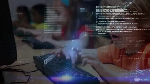 Children Engaging with Educational Coding Program in Classroom