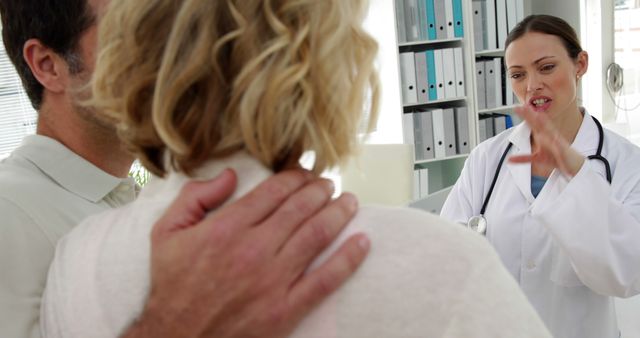 Doctor Consults Patients in Hospital Office - Download Free Stock Images Pikwizard.com