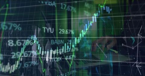 Trader analyzing neon candlestick charts on laptop with glowing financial dashboard