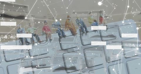 Miniature construction workers sitting on beam over keyboard network with digital blueprint