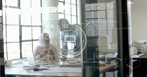 Architects Collaborating in Modern Office with Digital Interface