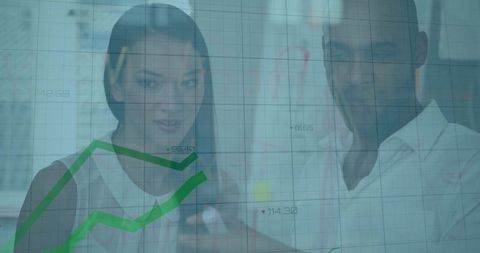 Coworkers Analyzing Growth on Digital Data Screen