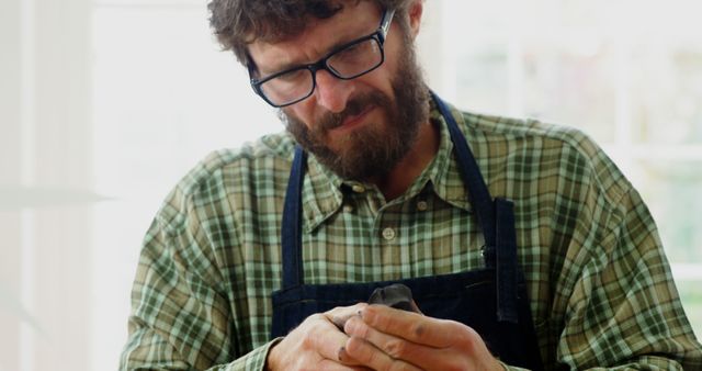 Bearded Artisan in Plaid Shirt Sculpting - Download Free Stock Images Pikwizard.com