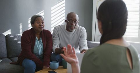 Financial Advisor Assisting Senior Couple at Home - Download Free Stock Images Pikwizard.com