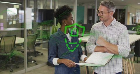 Discussing secure document review with digital shield overlay in modern office
