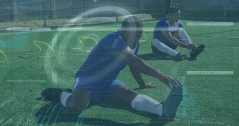 Diverse Football Players Stretching on Field with Digital Overlay