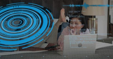 Couple Relaxing on Bed with Laptop and Phone, HUD Code Overlay, Remote Work Lifestyle