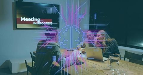 Team collaborating around laptop with ai brain hologram in boardroom meeting