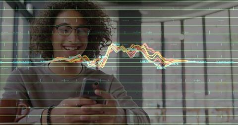 Business professional analyzing data with smartphone in office