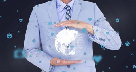 Businessman Holding Digital Globe with Connected Network Dots - Download Free Stock Images Pikwizard.com