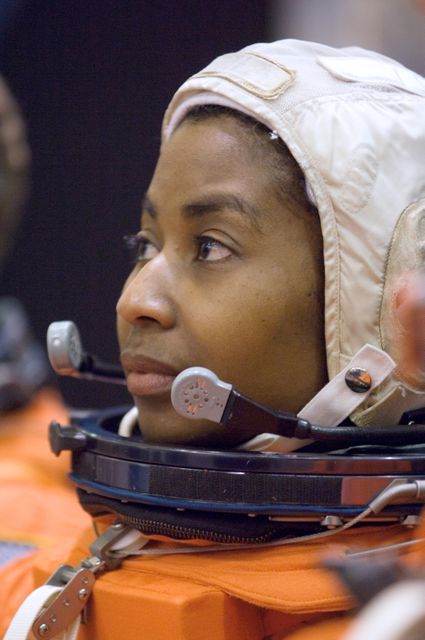 NASA astronaut Stephanie D. Wilson shown wearing a shuttle launch and entry suit during a training session at Johnson Space Center. This image highlights her dedication and preparation for the STS-120 mission aboard Space Shuttle Discovery, launched on October 23, 2007. Suitable for articles and publications about space exploration, NASA astronauts, and advancements in space travel.