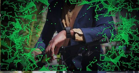 Gripping urban commuter holding bike handlebars in navy blazer with green network overlay