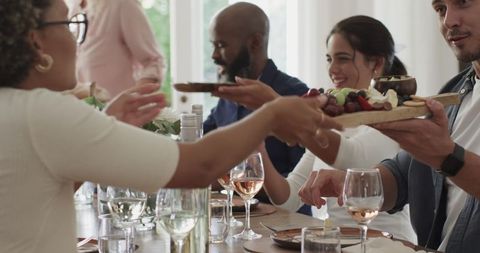 Guests Enjoying Meal Together at Wedding Celebration
