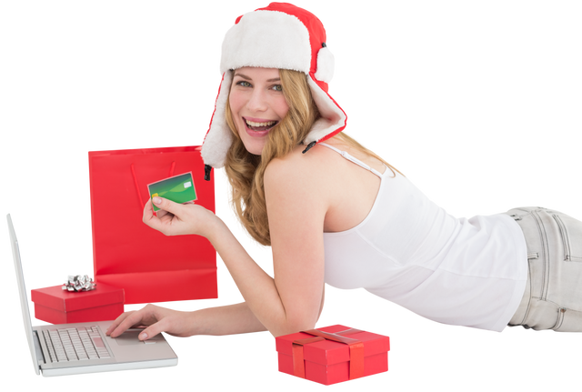 Happy Woman in Santa Hat Making Online Christmas Purchase with Laptop and Credit Card Transparent - Download Free Stock Videos Pikwizard.com