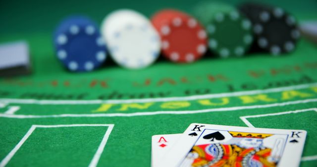 Playing cards, dices and casino chips on poker table in casino 4k