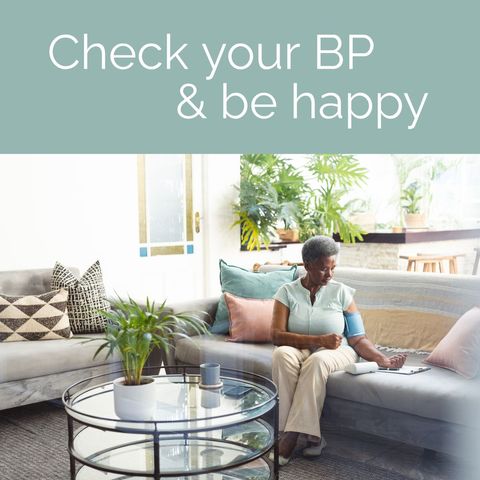 senior african american woman monitoring blood pressure at home - Download Free Stock Templates Pikwizard.com