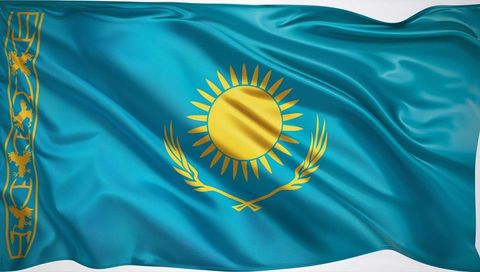 Kazakhstan flag waving with golden sun and soaring steppe eagle on turquoise field