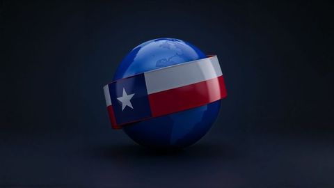 Blue Earth Globe Wrapped by Texas Flag Ribbon in Dark Setting