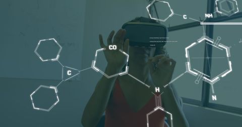 woman using vr headset with chemical formulas overlay - Download Free Stock Images Pikwizard.com
