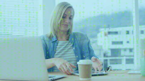 Businesswoman Engaging with Technology and Data Visualization