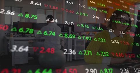 Businesswoman Focused on Work with Real-Time Stock Market Data