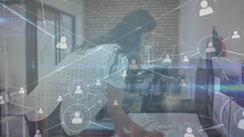 Businesswoman Navigating Digital Network in Modern Office