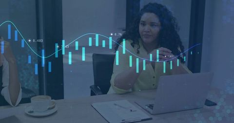 Professionals analyzing financial charts in office setting