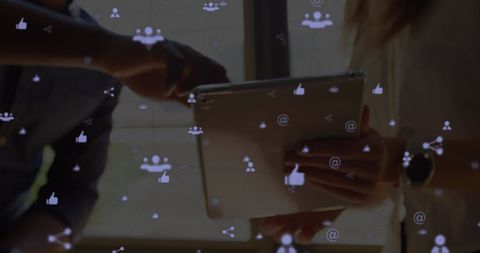 Team Collaboration with Digital Tablet and Social Media Icons