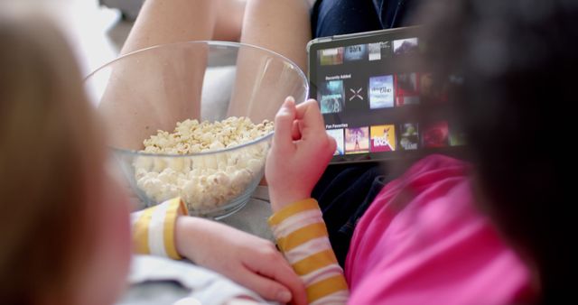 Children Watching Movie on Tablet with Popcorn - Download Free Stock Images Pikwizard.com