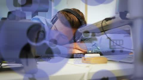 Exhausted Office Worker Falling Asleep Amidst Data Overload