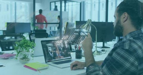 Professional collaboration in modern open office environment