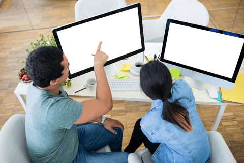 Two Designers Collaborating on Transparent Computer Screens - Download Free Stock Videos Pikwizard.com