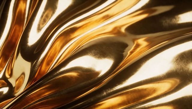 Shining gold ripple abstract metallic surface with glossy reflections and warm highlights