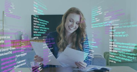 Smiling Businesswoman Analyzing Data with Digital Code Overlay