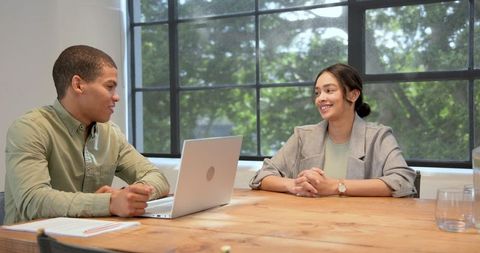 Diverse Professionals Engaged in Job Interview Process in Modern Office