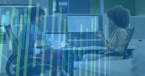 Coworkers Collaborating Over Data Analytics in Modern Office