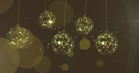 Swinging Gold Christmas Baubles and Starry backdrop