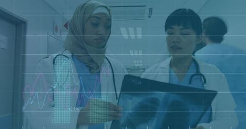 Diverse Female Doctors Analyzing X-Ray with Financial Data Overlay