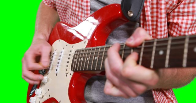 Close-Up Electric Guitar Playing on Green Screen Background - Download Free Stock Images Pikwizard.com