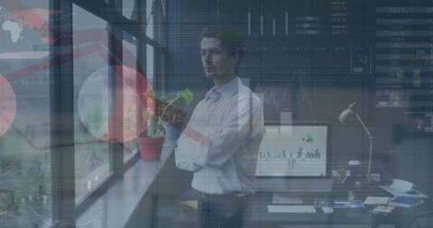 businessman reflecting on financial data insights in modern office - Download Free Stock Images Pikwizard.com