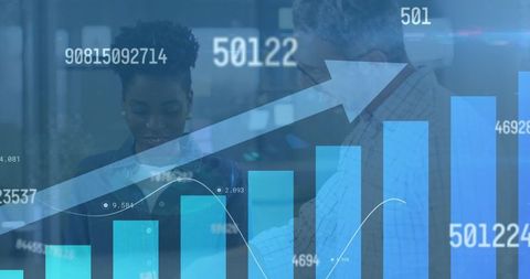 Diverse Coworkers Analyzing Financial Trends in Modern Office