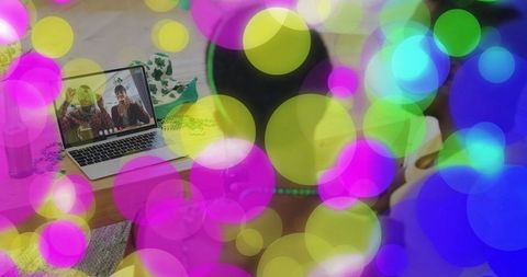 Online celebration with bright festive circles overlay